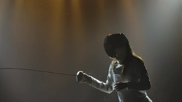 Swordsman Woman Training with Rapier