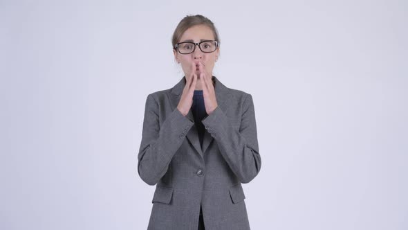 Young Stressed Businesswoman Looking Shocked