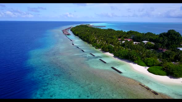 Aerial texture of perfect island beach time by blue green lagoon and white sandy background of a day