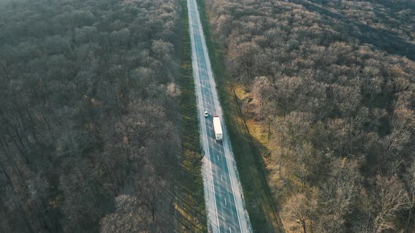 Aerial Top View Over Straight Road with Cars