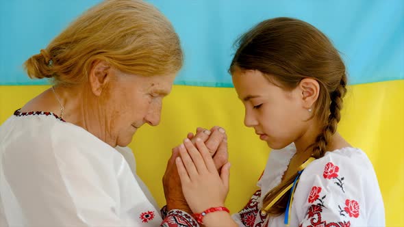 Ukrainian Grandmother and Granddaughter in Vyshyvanka