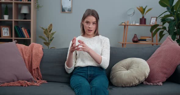 Young Female Person Looking To Camera and Showing with Deafmute Sign Language Save Planet