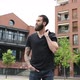 young beautiful bearded man posing outdoor looking away - VideoHive Item for Sale