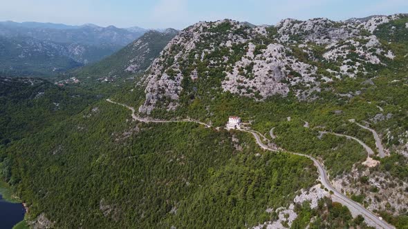 A Small Building in the Middle of the Mountain