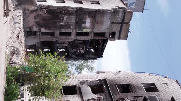 Vertical Video of the Consequences of the War in Ukraine  Burned Cars