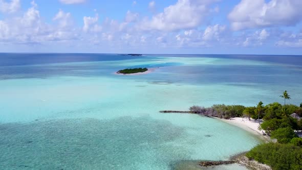 Aerial scenery of shore beach trip by blue lagoon and sand background