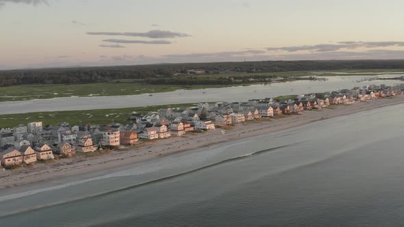 Wide aerial view Housing property along Wells Beach seaside shoreline, Maine