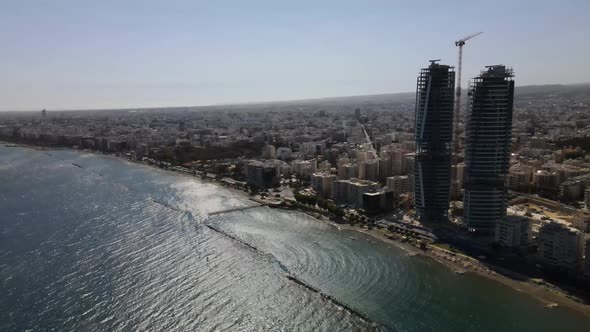 Embankment of Limassol in Cyprus. Modern architecture and old town. Skyscrapers.