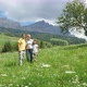 Portrait of family with son (8 to 9) in Alpine meadow, Alta Badia, Italy - VideoHive Item for Sale