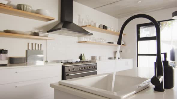 General view of luxury kitchen with sink and countertop