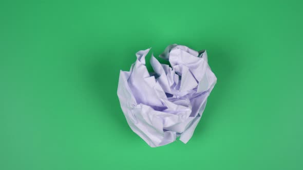 Stop motion animation paper wrinkles green screen.