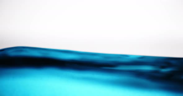 Blue Water Surface in Motion Against White Background