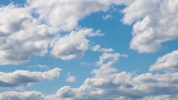 White Clouds Are Formed in the Blue Sky. Time Lapse