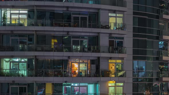 Flat Night Panorama of Multicolor Light in Windows of Multistory Buildings Aerial Timelapse