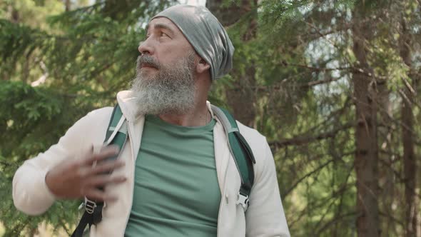 Portrait of Aged Man Is Hiking