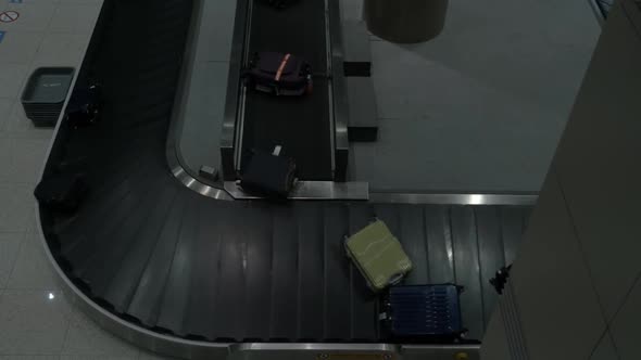 Timelapse of Luggage Arriving To Baggage Claim Area