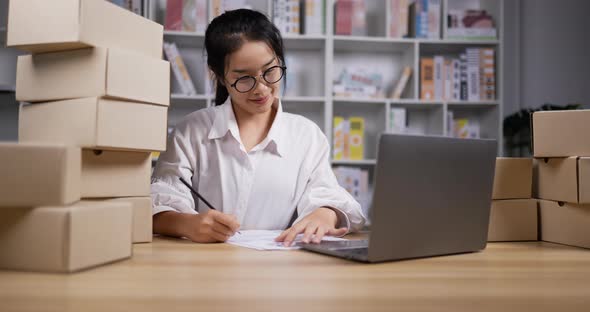 woman checking sell online