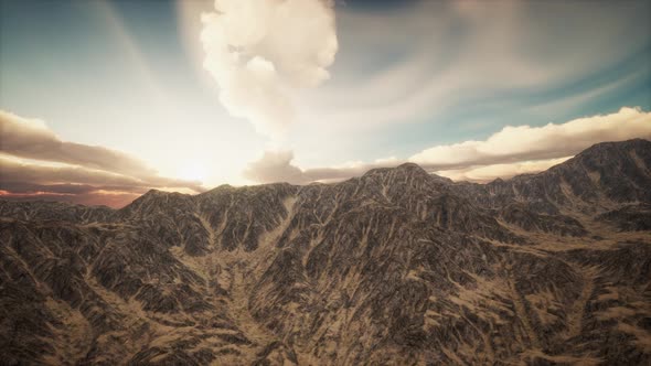 Sun Rays Against the Backdrop of the Mountains