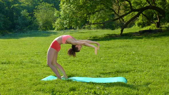 Young Woman Doing Sports at Nature