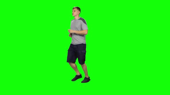 Young Male Goes Then Starts To Run, Waves His Hand Stand, Chroma Key