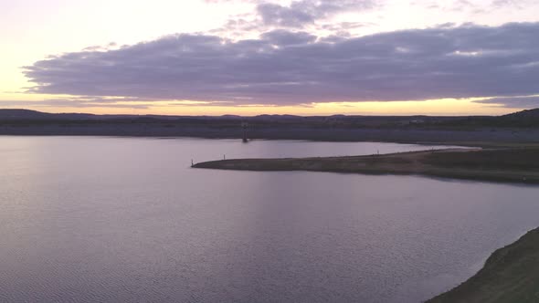 Drone panoramic aerial view of a camper van living vanlife at Minutos Dam in Arraiolos Alentejo at s