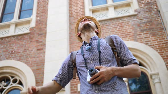 Traveler Man Sightseeing In City On Vacation