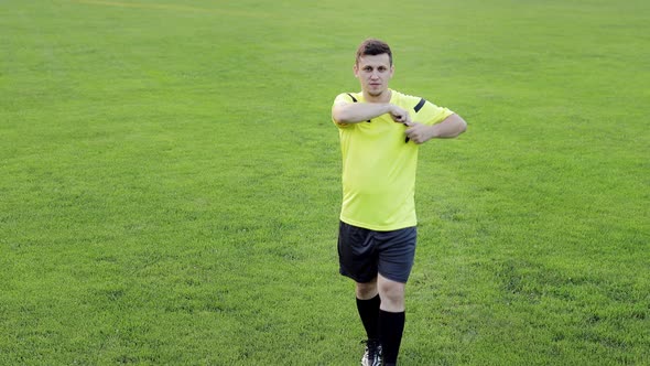 Soccer referee showing penalty, yellow and red card, removes the player