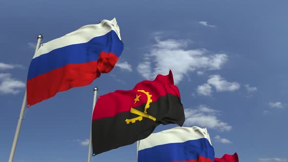 Waving Flags of Angola and Russia