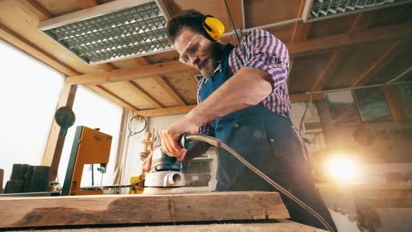 Carpentry Worker Polished Wooden Piece. Carpenter Working