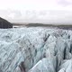 Low Aerial Forwards Motion Of A Blue Glacier In Island - VideoHive Item for Sale