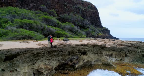 Couple kissing on the sea coast