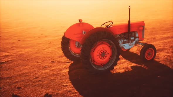 Vintage Retro Tractor on a Farm in Desert