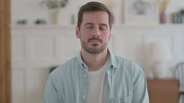 Portrait of Sad Young Man Feeling Upset and Crying