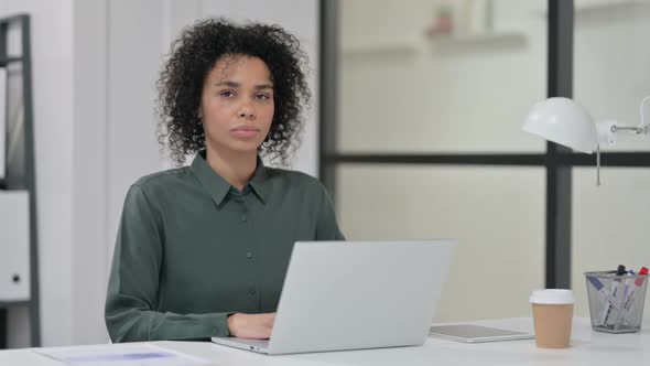 No Gesture By African Woman with Laptop