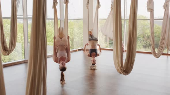 Lying Upside-Down On Yoga Hammocks