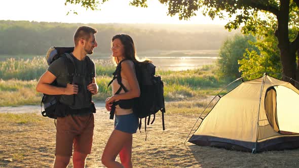 Couple Traveling with Backpacks