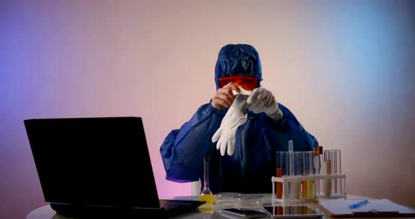 Woman Health Professional Is Working in Medical Lab, Researching Vaccine From New Virus, Using