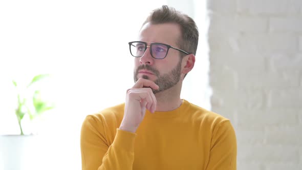 Portrait of Pensive Man Thinking