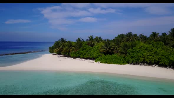 Aerial drone shot nature of relaxing island beach adventure by transparent ocean and bright sand bac