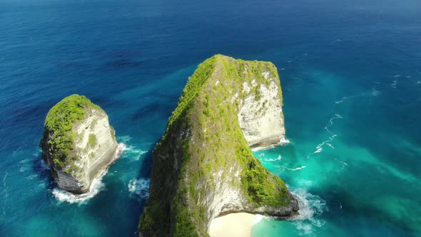 Drone Shot By droneOcean with Waves and Rocky Clif fBali, Indonesia. Aerial View of Big Blue Sea