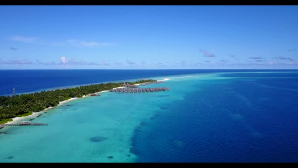 Aerial drone nature of exotic bay beach vacation by clear lagoon and white sandy background of a day