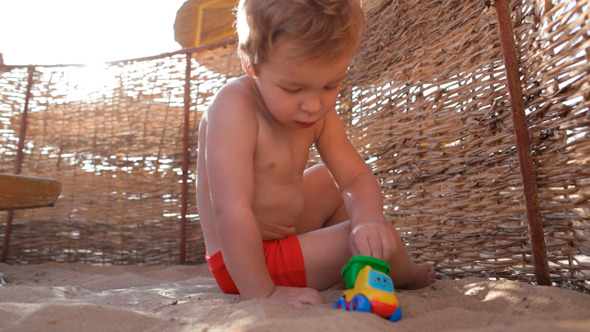 Child Playing on  Beach