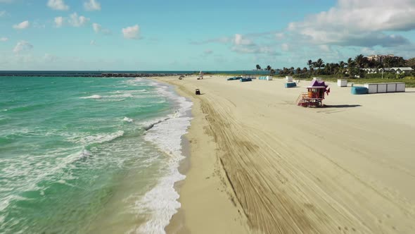 Clean empty beach Miami 4k aerial video