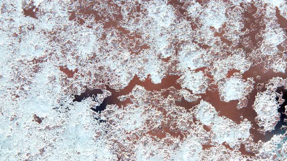 Window Glass Covered with Melt Snow and Ice