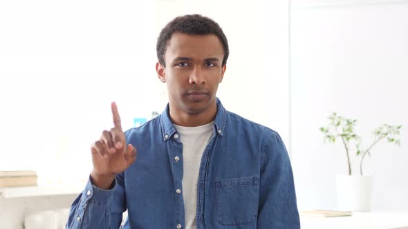 Waving Finger, Rejecting Young Afro-American Man, Portrait