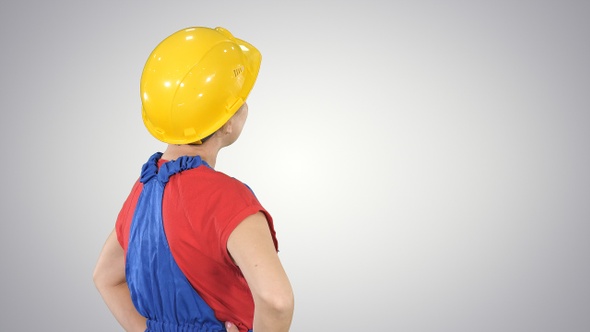 Engineer construction worker woman turning to camera 