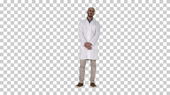 Standing young serious arab doctor, Alpha Channel