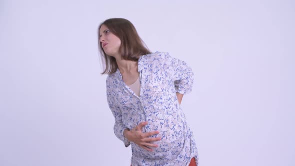 Stressed Young Pregnant Woman Having Back Pain