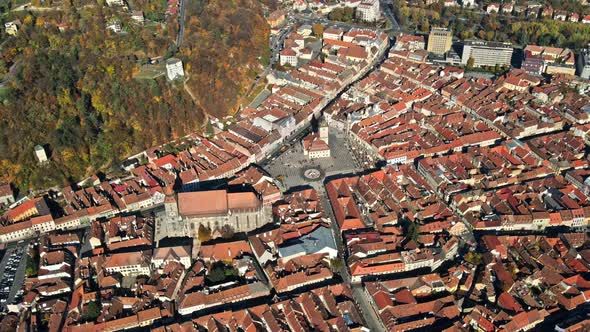 Aerial drone view of The Council Square in Brasov, Romania. Old city centre with County Museum of Hi