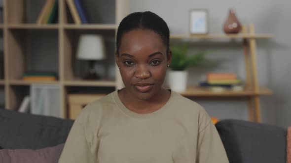 Portrait of African American Woman in Cozy Flat